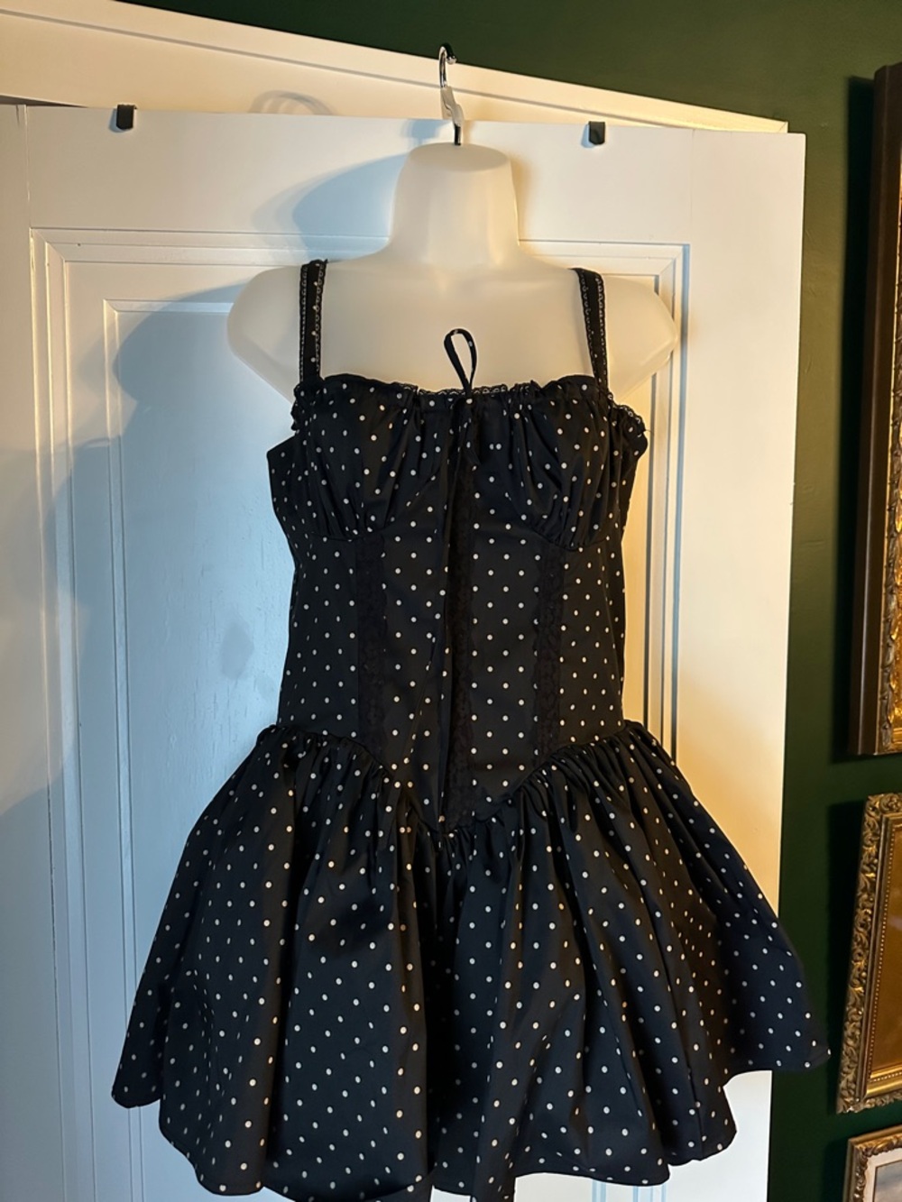 Black Polka Dot Mini Dress with Ruffled Skirt and Lace up Back